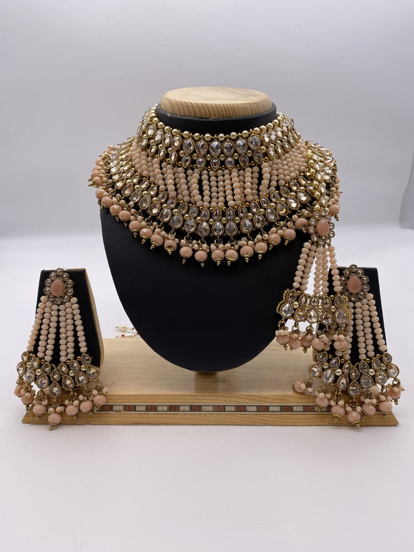 Full Coverage Choker Set in Gold Base, Light Peach Beads, Ivory Pearls comes With Big Earrings and Tikka