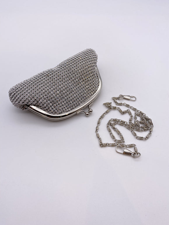 Small silver outlet clutch bag