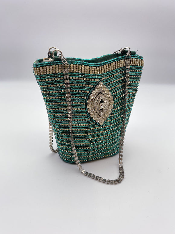 Turquoise clutch hotsell bag uk