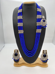 Four Strand Rani Haar with Royal Blue Beads, Rhinestones in a Silver Base, with Tikka and Round Earrings - Mothi Maala Collection